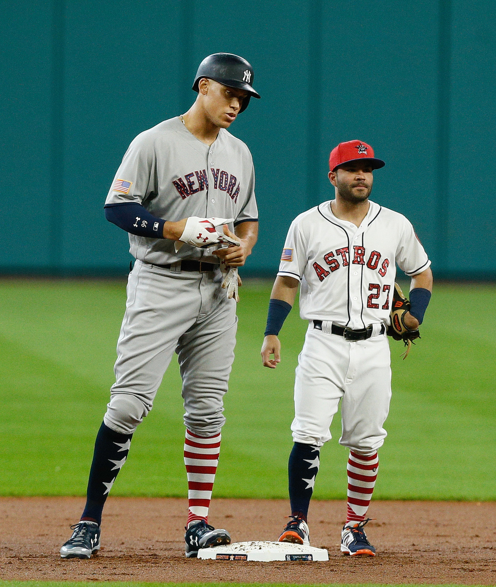 Jose Altuve and Aaron Judge: Yankees vs. Astros, Two Baseball Giants Compared.