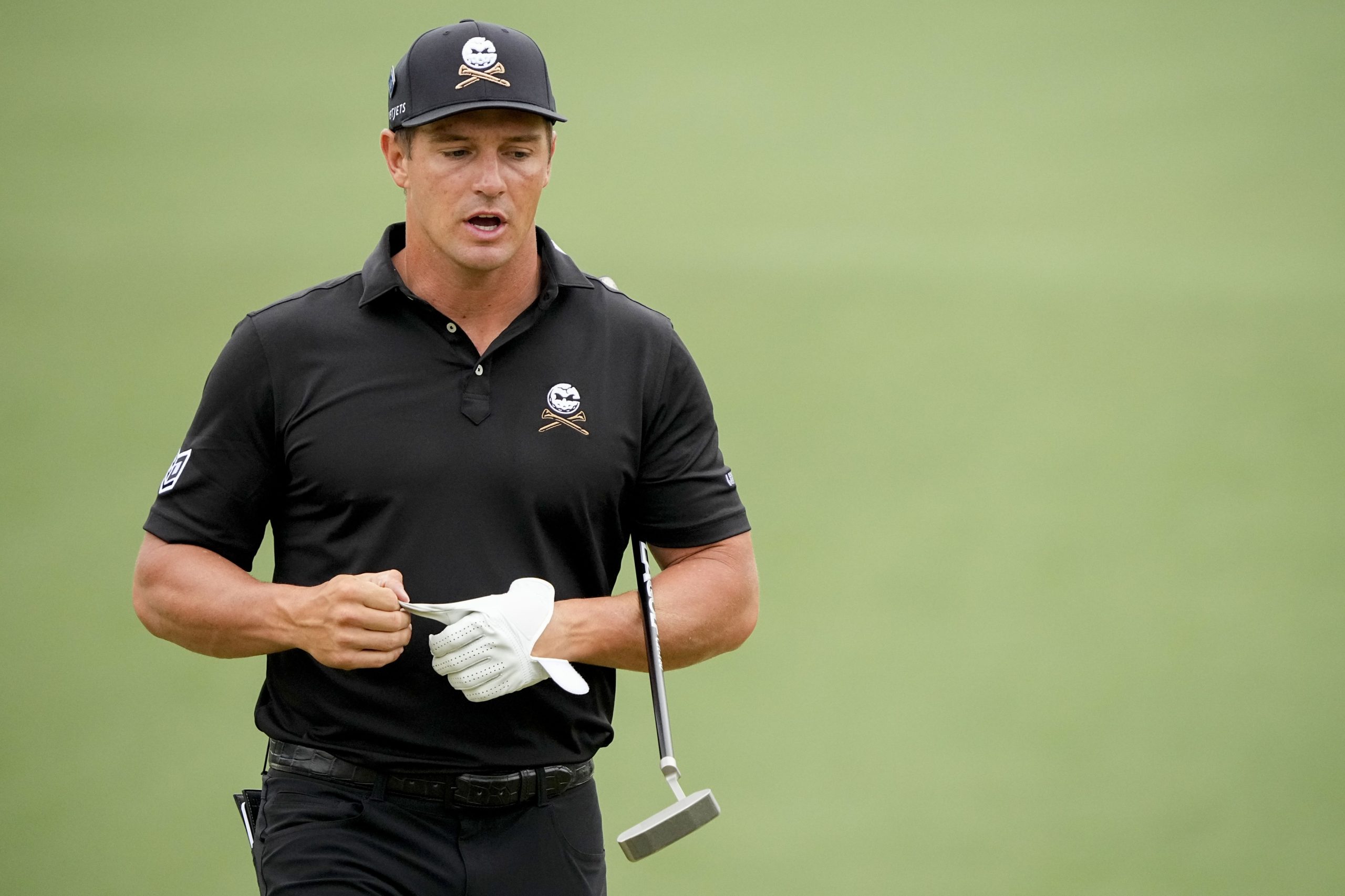 How did fans react to the Bryson DeChambeau MAGA hat situation? See the different opinions online.