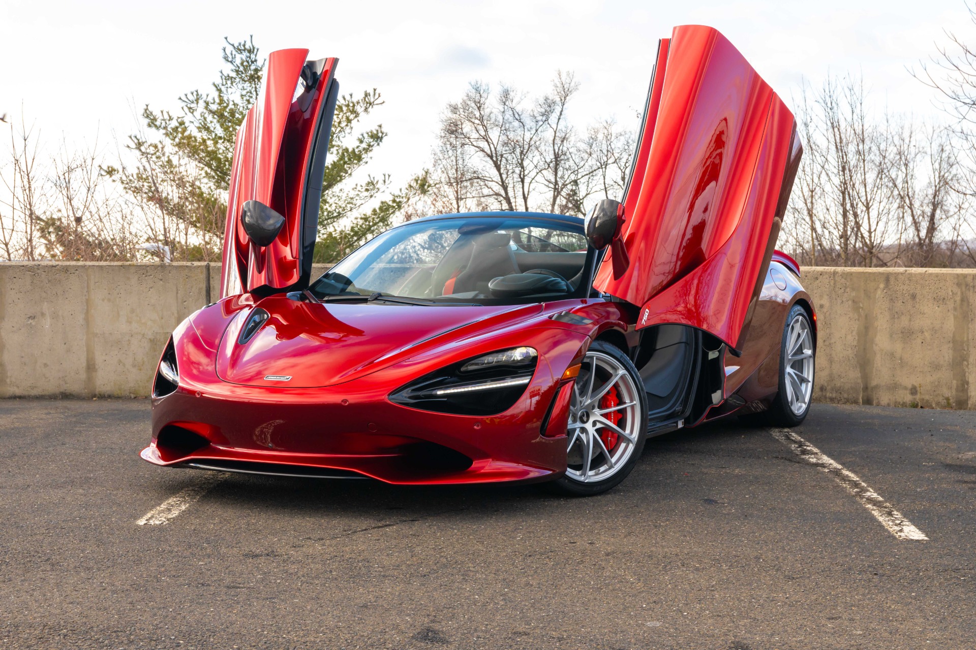How much does a brand new red mclaren actually cost? Get all the real price details and information inside!